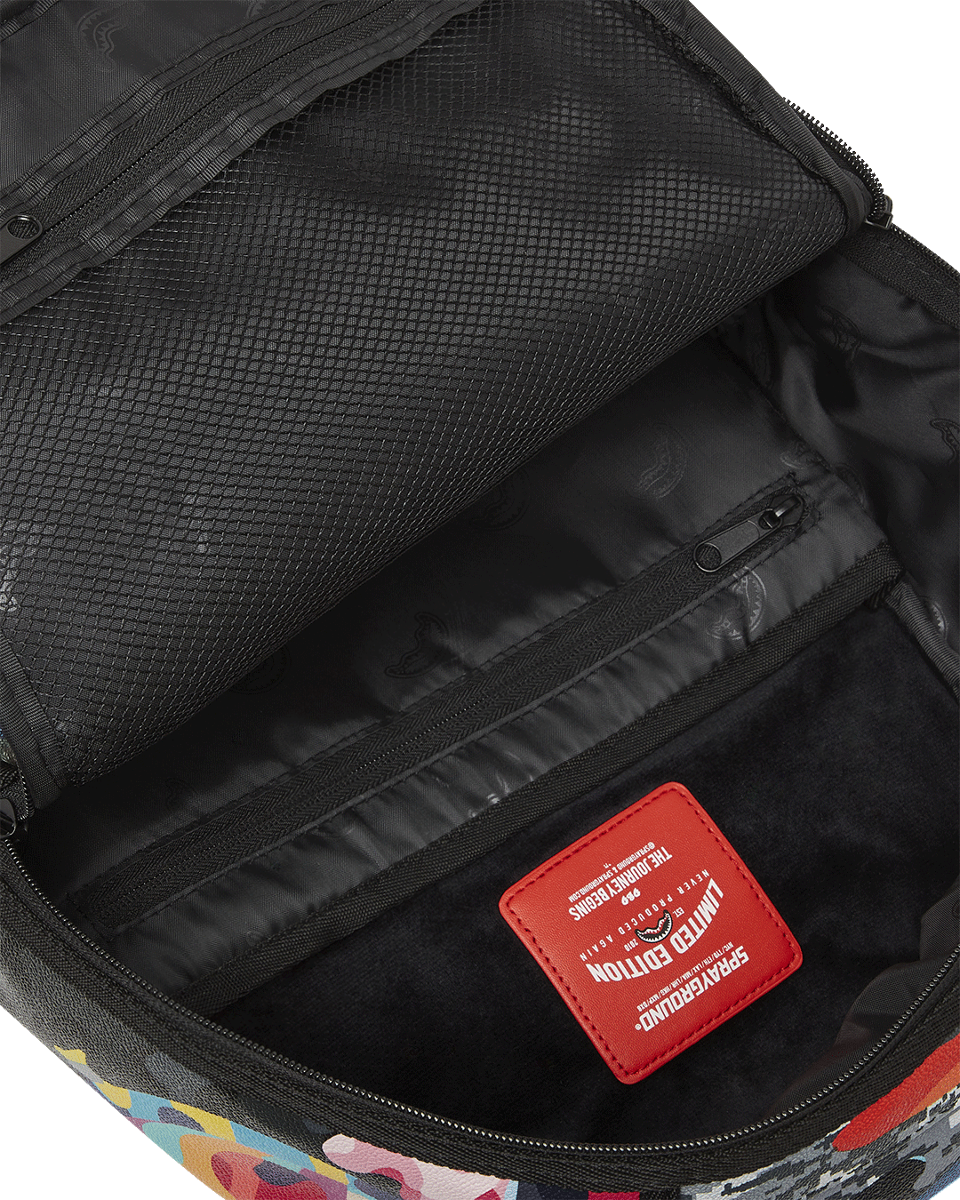 SLICED AND DICED CAMO BACKPACK